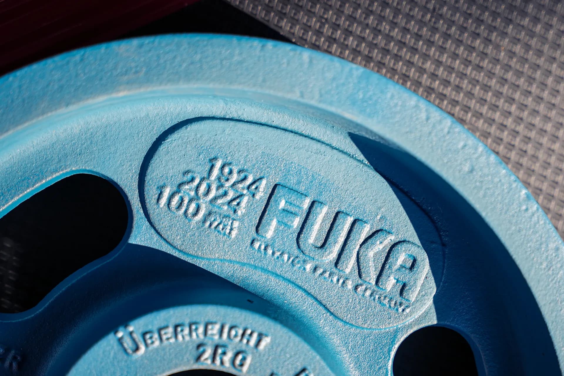 Cast FUKA elevator sheave with the centenary mark 1924 to 2024 raised in the casting