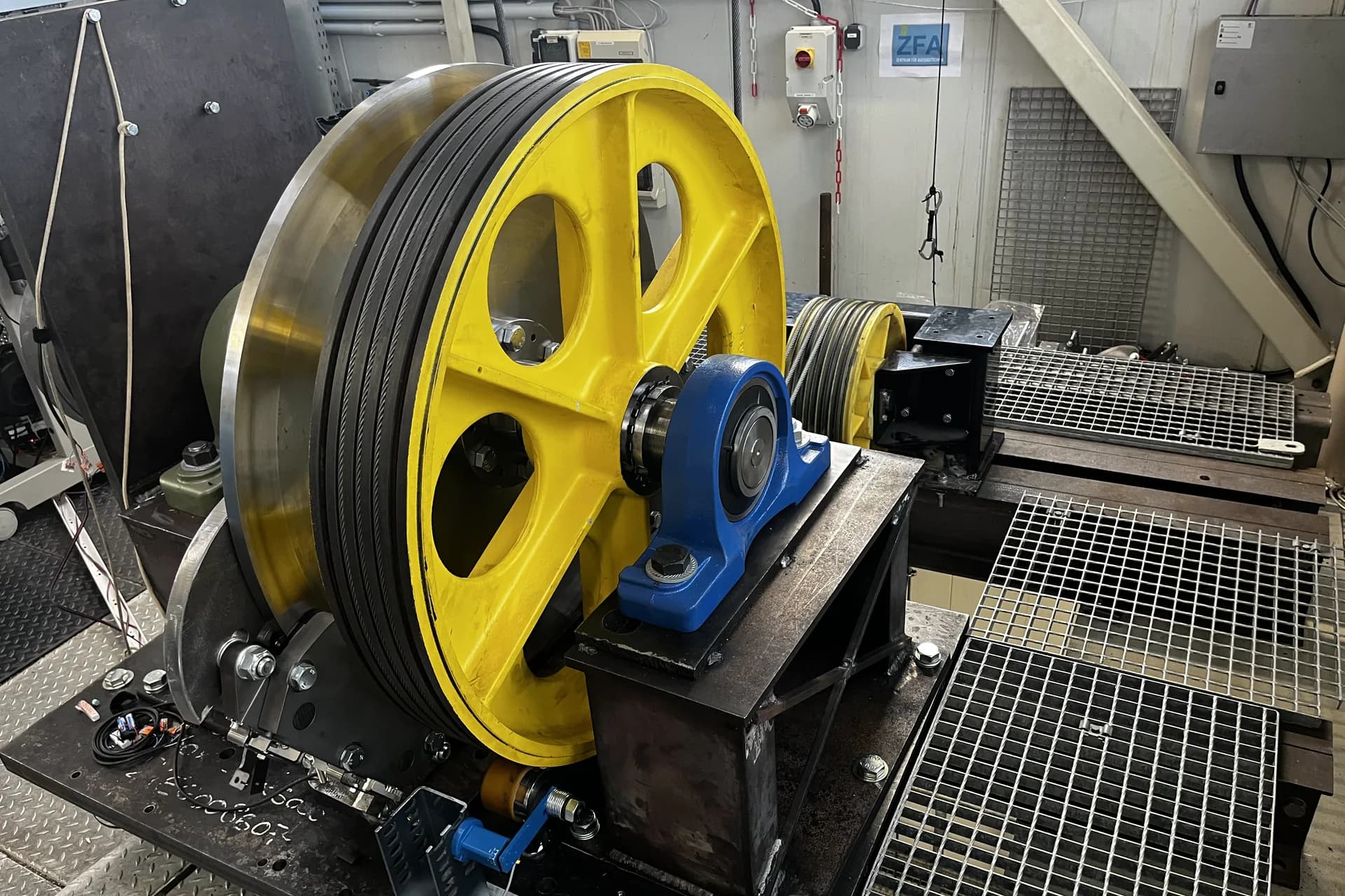 A FUKA traction sheave mounted on a test rig with bearing blocks and measuring equipment